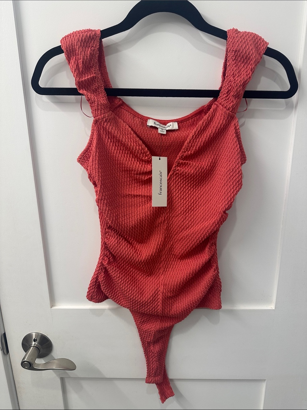 Francesca's Coral Textured Sleeveless Bodysuit